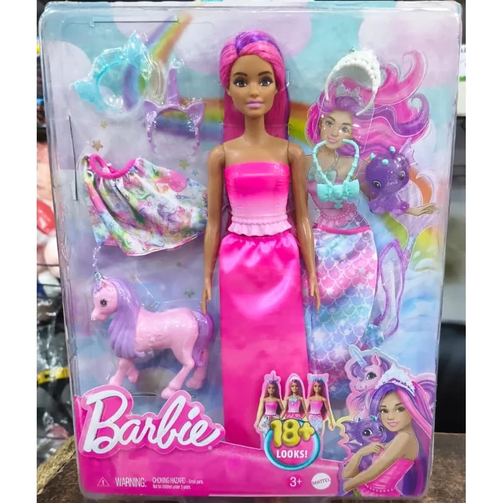 Barbie fairytale doll with pink and purple hair, unicorn pet and fashion accessories in retail packaging