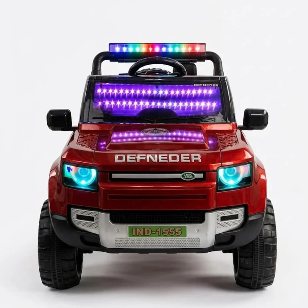 Red Defender-style kids ride-on jeep front view with lights on
