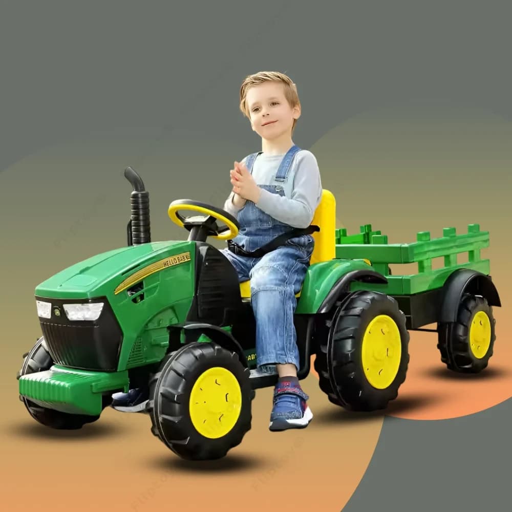 Green kids ride-on tractor with yellow wheels and a trailer